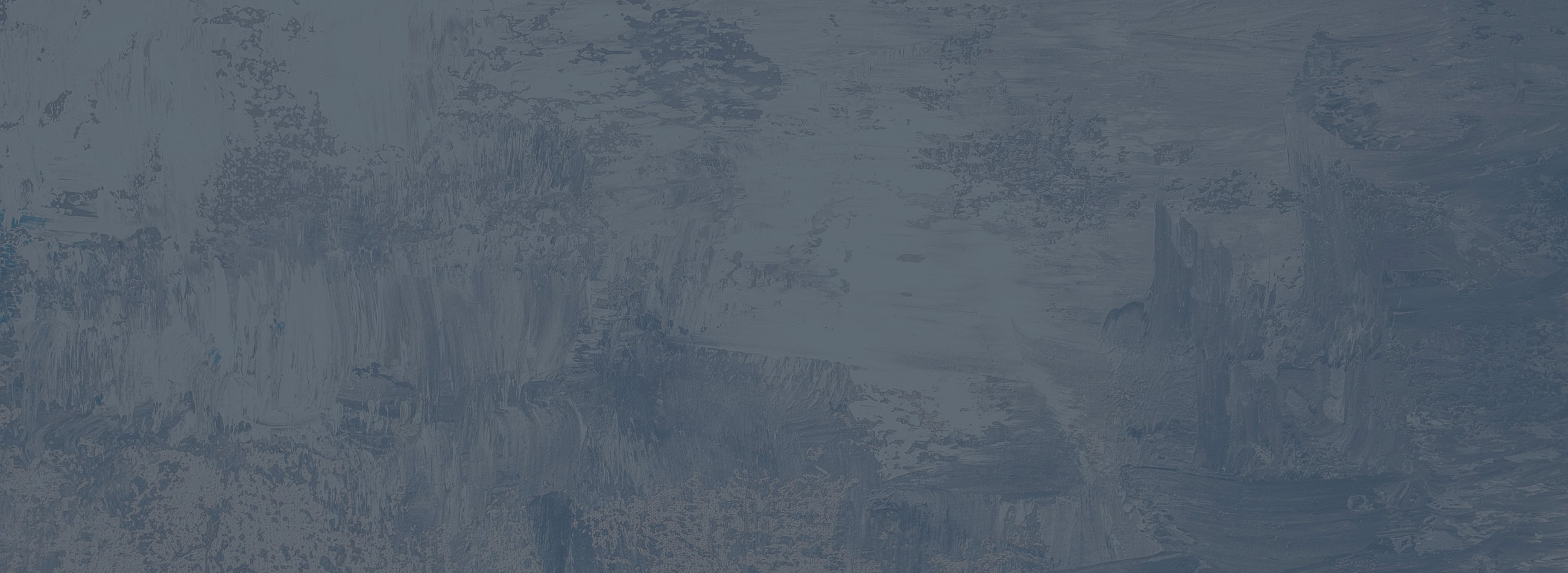 Abstract blue textured background with brush strokes.