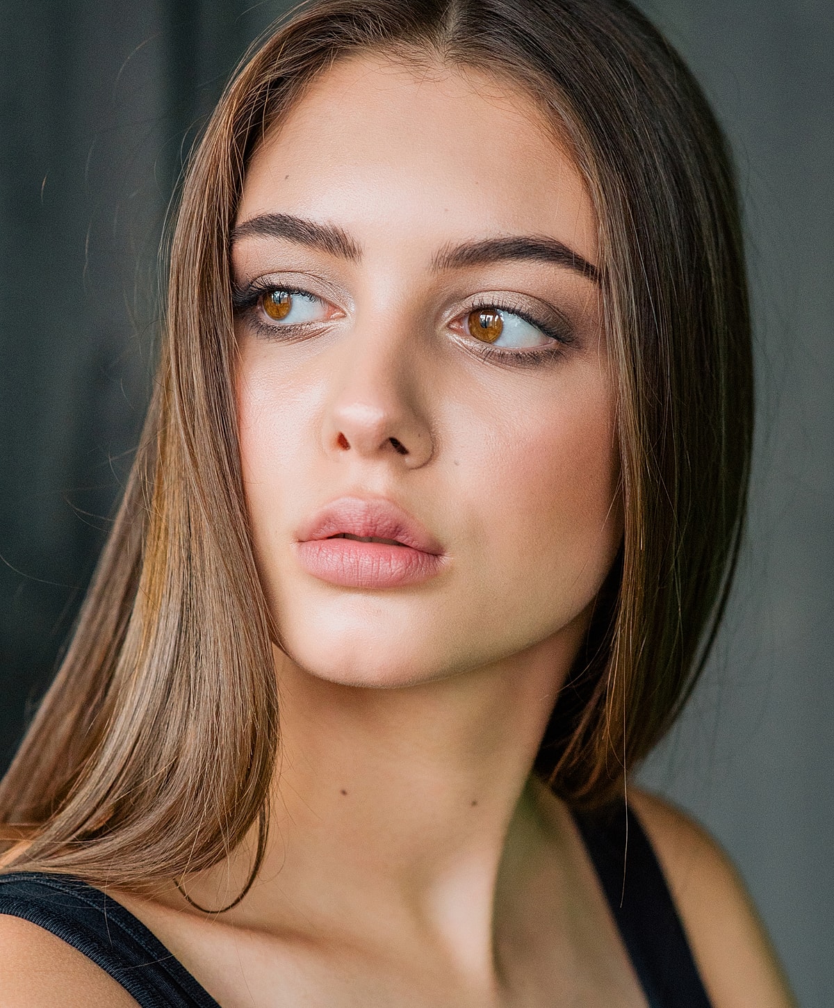 Portrait of a young woman with natural makeup.