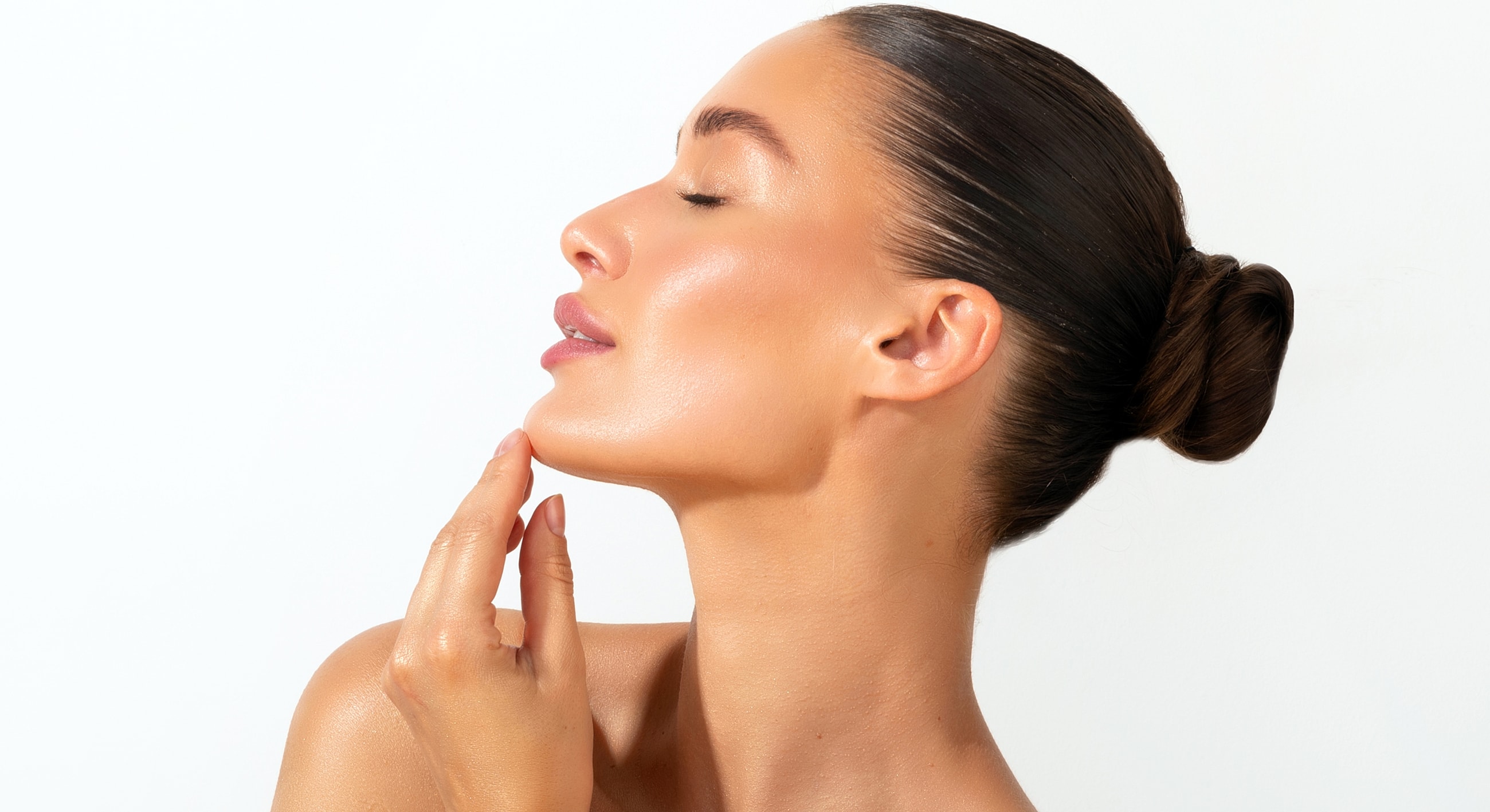 Woman with smooth skin and elegant profile.