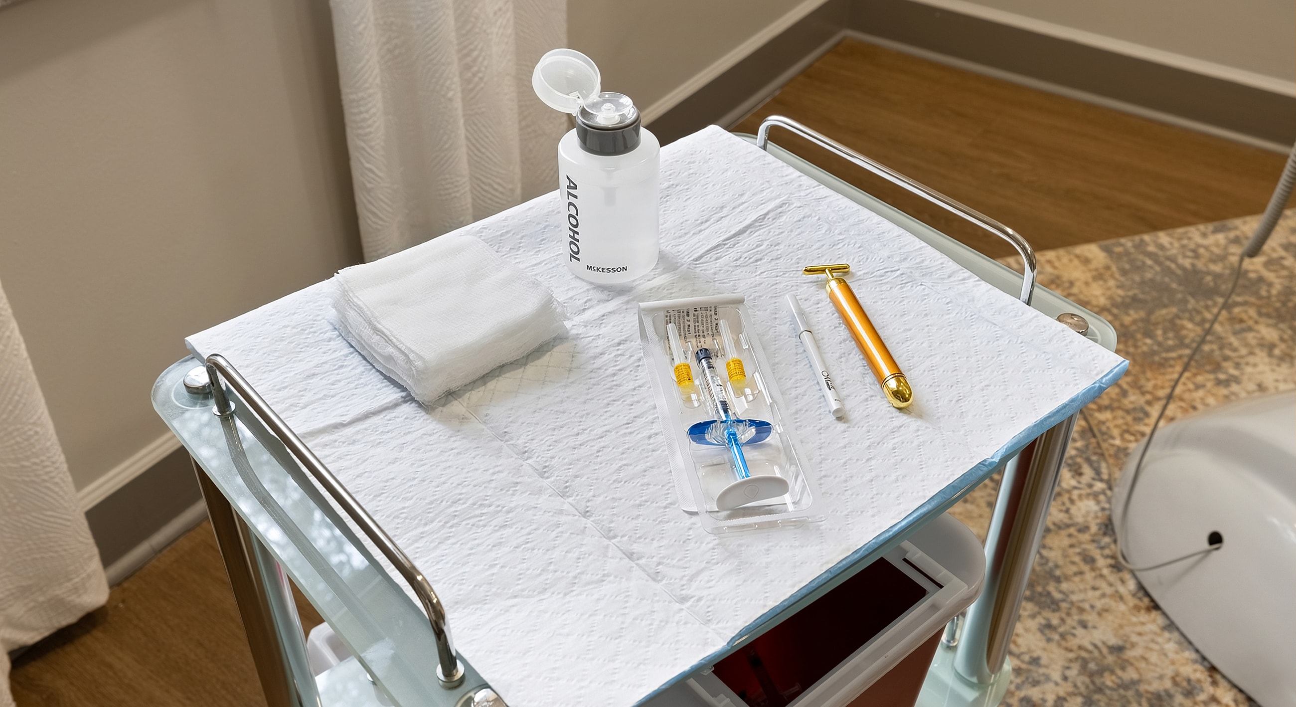 Medical supplies organized on a treatment cart.